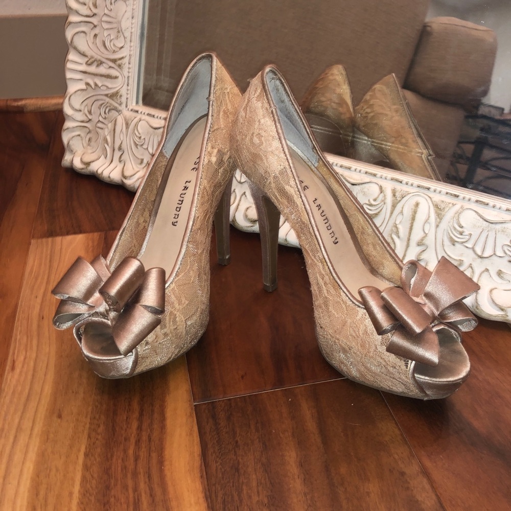 Nude lace high heels with bow accent